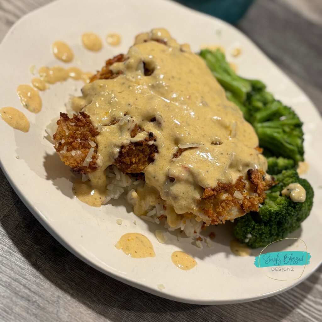 Parmesan Crusted Chicken Thighs with Creamy Garlic Sauce – family favorite dinner recipe by SimplyBlessedDesignz