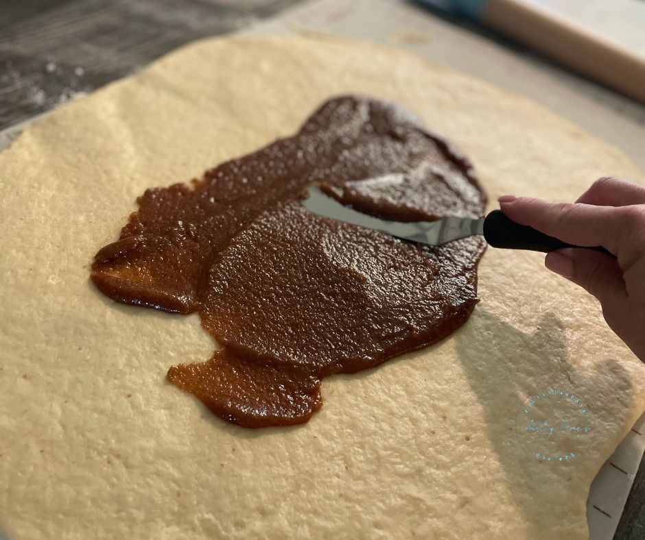 Preparing dough for sourdough cinnamon rolls with cinnamon sugar filling