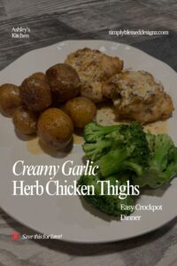 Plated creamy garlic herb chicken thighs with baby potatoes and steamed broccoli — an easy crockpot dinner.