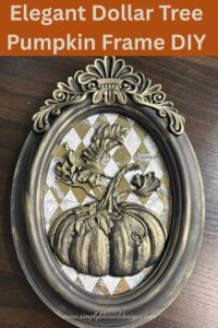 Elegant Dollar Tree pumpkin frame DIY with black matte paint, gold harlequin rice paper, resin pumpkins, and white gold metallic wax on an oval frame.